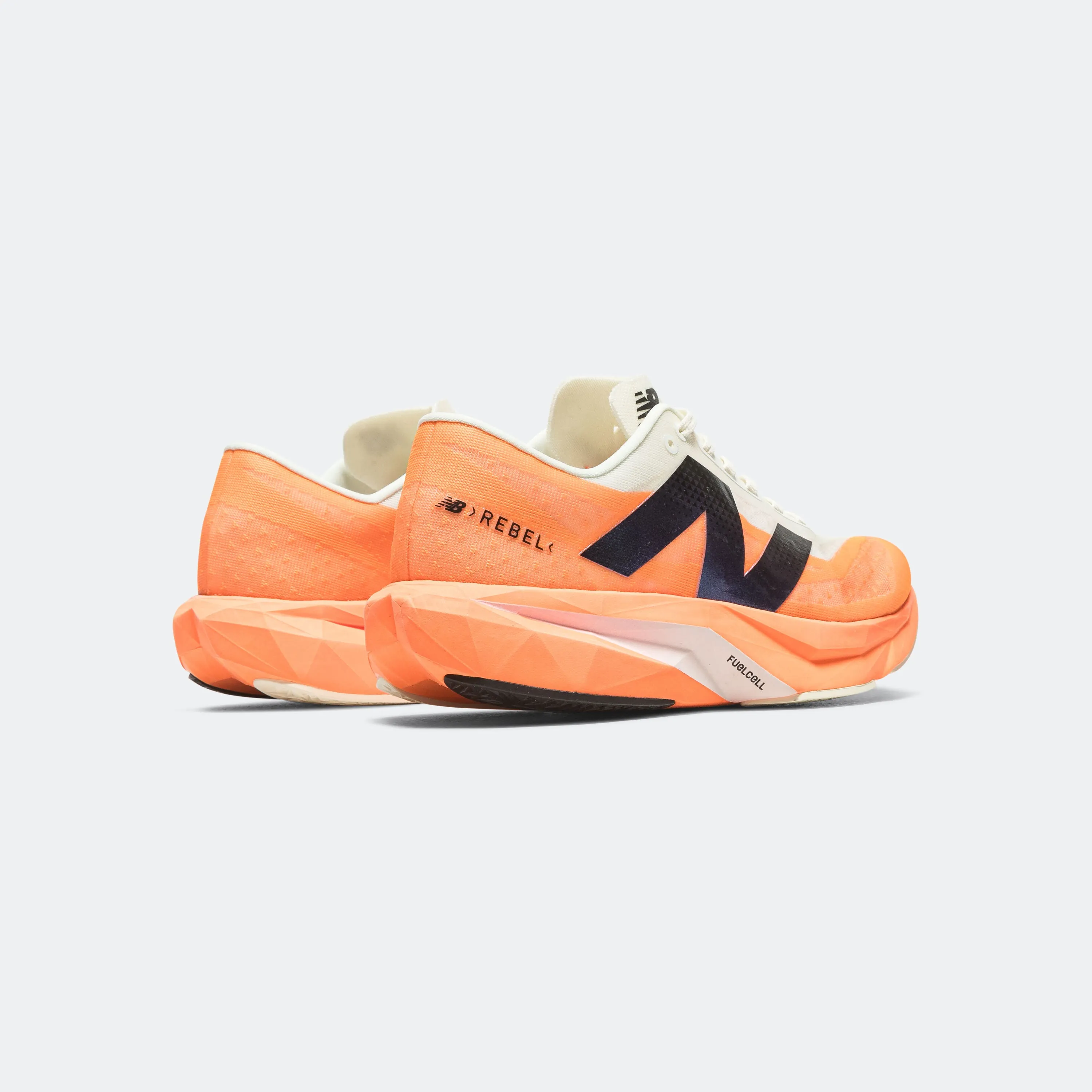 Womens FuelCell Rebel v4 - Hot Mango/Angora-Black
